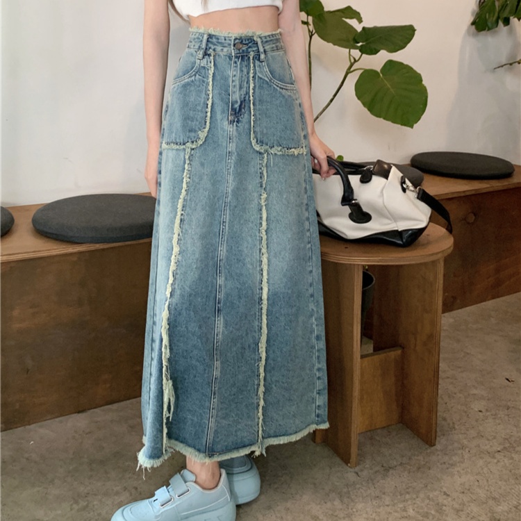 デニムファッション 裾フリンジ加工デニムロングスカート